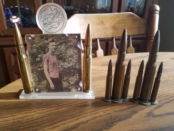 Salt-and-pepper-shakers-and-frame.-Henrly-O.-Tomlin-collection-via-Jeanette-Tomlin