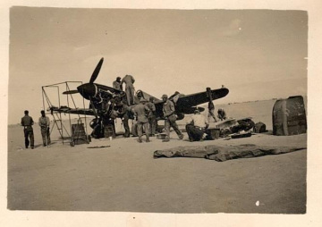 79th-FG-P-40-undergoing-maintenance-in-the-desert.-AFHRA-photograph