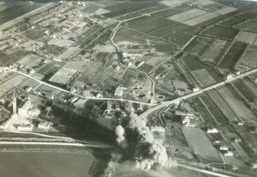 Explosion-by-a-bridge.-Roy-A.-Larson-collection-via-his-family