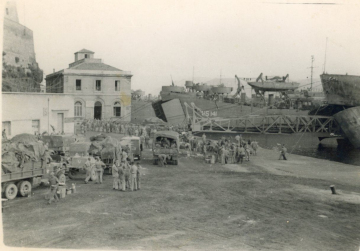 Trucks-and-LSTs-at-unknown-location.-Elven-G.-Hubbard-collection-via-his-family