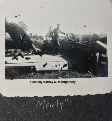 85th-FS-Bartley-D.-Montgomery-by-damaged-German-airplane-possibly-Switzerland-1945.-Stewart-Spencer-via-Paul-Spencer