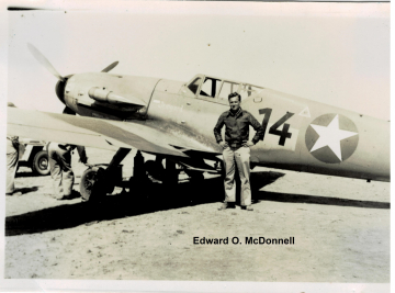 87th-FS-Edward-O.-McDonnell-beside-Bf-109-Irmgard.-Edward-O.-McDonnell-collection-via-the-McDonnell-Barry-family