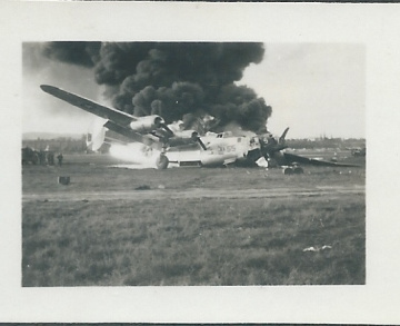 B-24-on-fire-possibly-at-Capodichino-Italy-April-1944.-Henry-O.-Tomlin-collection-via-Jeanette-Tomlin