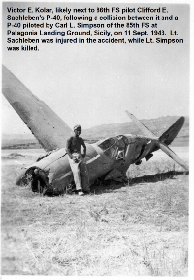 1_85th-FS-armorer-Victor-Kolar-in-Sicily-with-wrecked-P-40.-James-Connors-collection-via-John-Connors