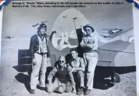 1_85th-FS-pilot-George-Rocky-Blare-and-others-by-the-tail-of-likely-John-Martins-P-40.-Charles-Grogan-collection-via-Steve-Grogan