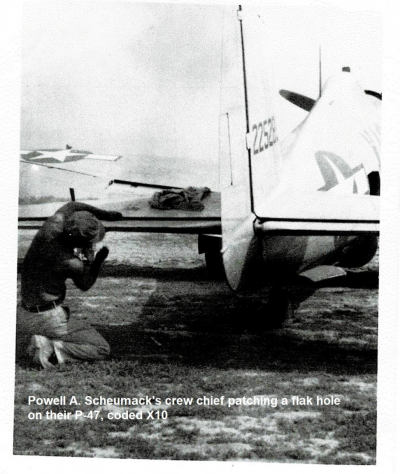 1_85th-FS-pilot-Powell-Scheumacks-P-47-X10-having-a-flak-hole-patched-by-his-crew-chief.-Photograph-via-Powell-Scheumack.
