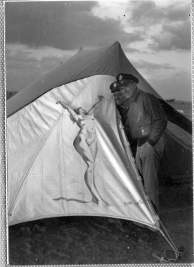 79th-FG-pilots-by-tent-with-artwork.-Richards-Hoffman-collection-via-Hogue-and-Whittenberg
