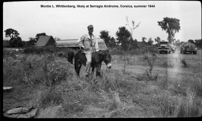 85th-FS-Montie-L.-Whittenberg-on-donkey-likely-at-Serragia-Airdrome-Corsica-summer-1944.-Montie-Whittenberg-collection-via-Ron-Whittenberg