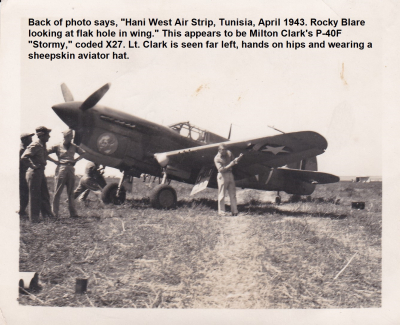 85th-FS-P-40-possibly-Milton-Clarks-X27-named-Stormy-Hani-West-LG-Tunisia-April-1943-Rocky-Blare-inspecting-flak-hole.-Robert-Kelley-collection-via-Peter-Kelley