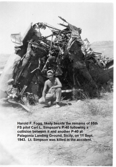85th-FS-armorer-Harold-Fogg-in-Sicily-with-wrecked-P-40.-James-Connors-collection-via-John-Connors-1