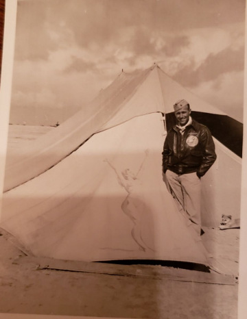 85th-FS-pilot-Tom-Cox-in-front-of-Lt.-Hoaglands-tent.-Samuel-L.-Say-collection-via-family