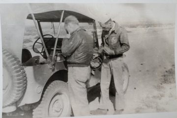 85th-FS-pilots-Major-Schoellkopf-rt-and-Lt.-Hoagland-eating-a-picnic-lunch-of-the-way-to-Tunis.-Samuel-L.-Say-collection-via-family
