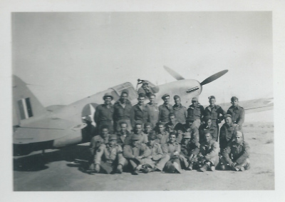 85th-FS-Engineering-Section-in-front-of-P-40-at-LG-174-Egypt-Dec.-1942.-Henry-O.-Tomlin-collection-via-Jeanette-Tomlin