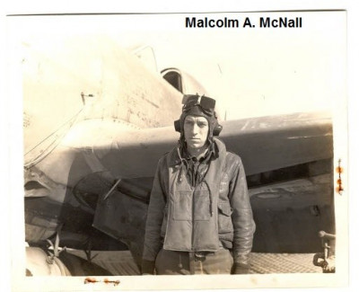 85th-FS-Malcolm-A.-McNall-by-P-47.-AFHRA-photograph