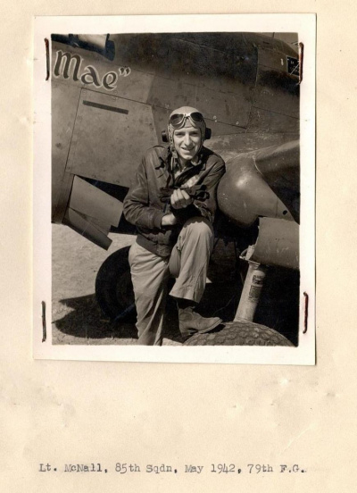85th-FS-Malcolm-Joe-McNall-beside-his-P-40-named-Betty-Mae.-AFHRA-photograph