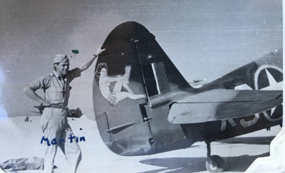 85th-FS-pilot-John-Martin-by-the-artwork-that-likely-was-on-his-P-40-X37.-Charles-Grogan-collection-via-Steve-Grogan