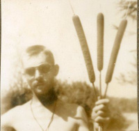 85th-FS-unidentified-holding-cattails-possible-at-Corsica-1944.-Elven-G.-Hubbard-collection-via-his-family