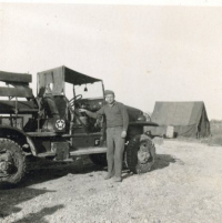 Unidentified-individual-beside-truck.-Elven-G.-Hubbard-collection-via-his-family
