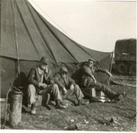 Unidentified-individuals-outside-tent.-Elven-G.-Hubbad-collection-via-his-family