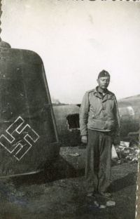 Unidentified-lieutenant-beside-damaged-German-airplane.-Elven-G.-Hubbard-collection-via-his-family