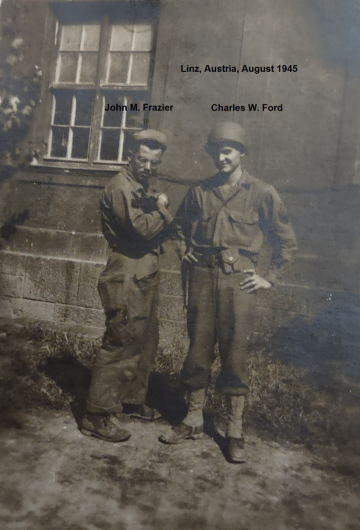 86th-FS-Charles-W.-Ford-RT-Sgt-of-the-guard-and-John-M.-Frazier-holding-dog-Linz-Austria-Aug.-1945.-Charles-W.-Ford-collection-via-his-family