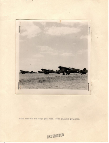 86th-FS-P-40s-taking-off-for-Cape-Bon-mission.-AFHRA-photograph