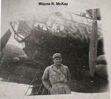86th-FS-Wayne-R.-McKay-beside-German-Ju-88-Italy-1943.-Wayne-R.-McKay-collection-via-his-family