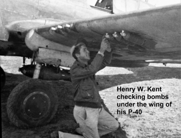 86th-FS-Henry-W.-Kent-collection-armorer-working-bombs-on-a-P-40-via-his-family