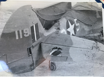 87th-FS-P-40-with-battle-damage.-Charles-Grogan-collection-via-Steve-Grogan