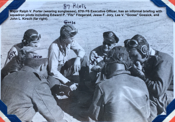 87th-FS-pilots-Jesse-Jory-Edward-Fitzgerald-and-Lee-Goose-Gossick-briefed-by-87th-FS-XO-Major-Ralph-Porter.-Charles-Grogan-collection-via-Steve-Grogan-2