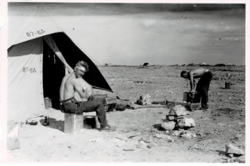 Unidentified-individuals-by-87th-FS-tent.-Edward-O.-McDonnell-collection-via-the-McDonnell-Barry-family