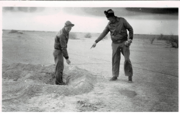 Unidentified-individuals-digging-in-sand.-Edward-O.-McDonnell-collection-via-the-McDonnell-Barry-family