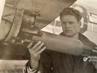4.5-inch-rocket-being-loaded-into-P-47-bazooka-tube-by-unidentified-individual.-Sam-Freedman-collection-via-his-family