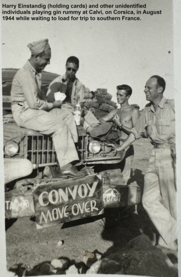 87th-FS-Harry-Einstandig-holding-cards-Calvi-August-1944.-Harry-Einstandig-collection-via-daughter-Bonnie-Hill