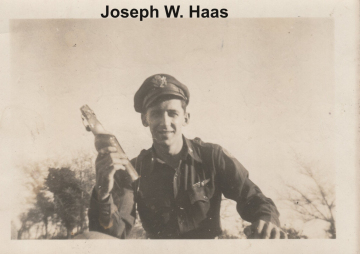87th-FS-Joseph-W.-Haas-holding-bottle.-Joseph-W.-Haas-collection-via-his-family