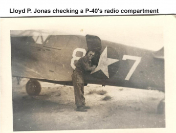 87th-FS-Lloyd-P.-Jonas-checking-P-40-radio-compartment-possibly-Italy.-Lloyd-P.-Jonas-collection-via-his-family