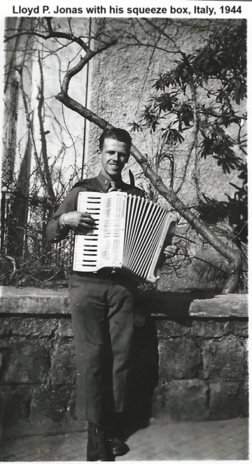 87th-FS-Lloyd-P.-Jonas-with-squeeze-box-Italy-1944.-Lloyd-P.-Jonas-collection-via-his-family