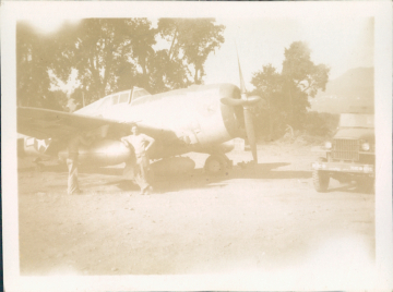 87th-FS-P-47-and-truck-possibly-Seragia-Airfield-Corsica-summer-1944.-Walter-B.-Snook-collection-via-his-family