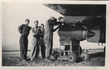 Unidentified-arming-P-47-with-1000-lb-bomb.-Chuck-Lankford-collection-via-his-family