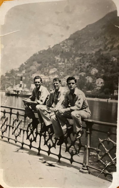 86th-FS-Crew-Chief-Henry-Nivins-far-left-at-Lake-Como-Italy-June-1945-via-daughters-Julie-Kelly-and-Janice-Large