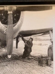 Individual-likely-86th-FS-working-on-P-47-wheel-bay.-Robert-C.-Maratta-collection-via-Robert-C.-Maratta-Jr