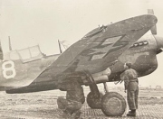 Personnel-inspecting-damaged-P-40-likely-86th-FS-at-Madna-LG-Italy.-Robert-C.-Maratta-collection-via-Robert-C.-Maratta-Jr